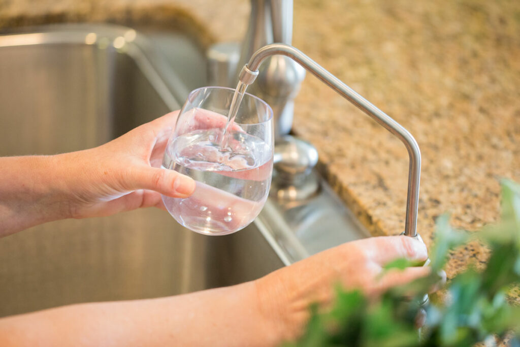 a glass of water with from a Reverse Osmosis System in Lake Barrington, Illinois